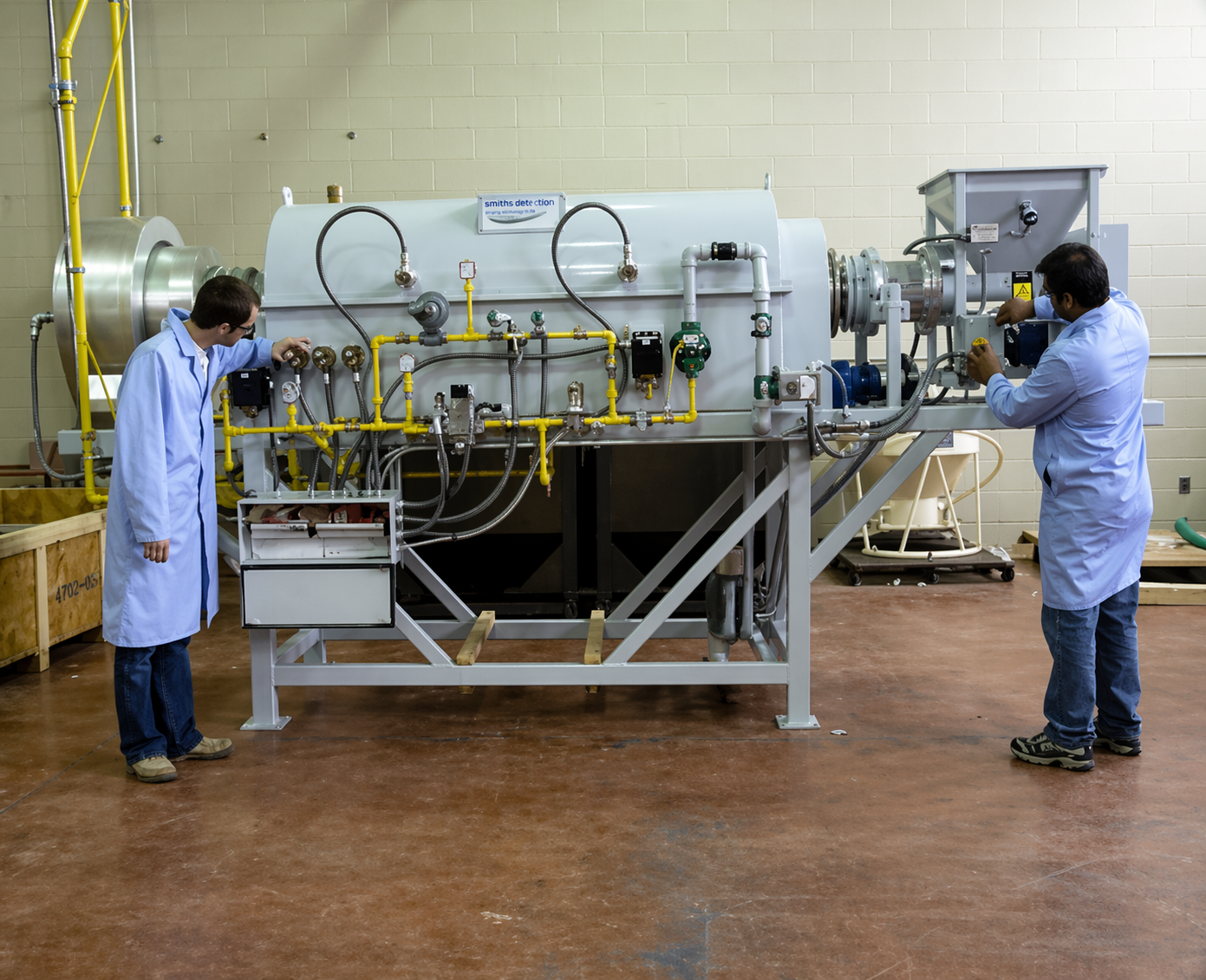 Researchers operating the 0.3-ton/day Torrefaction Pilot-scale Unit